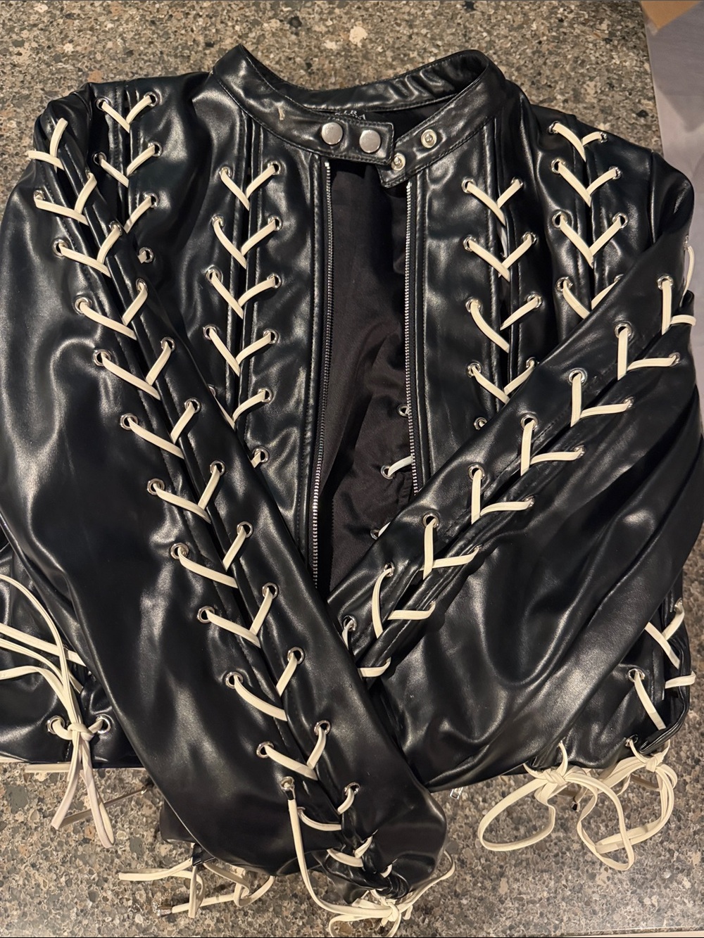 AKIRA Black Faux Leather Jacket with Cream Lace-Up Trim